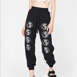Dolls Kill Smiley Face Sweatpants